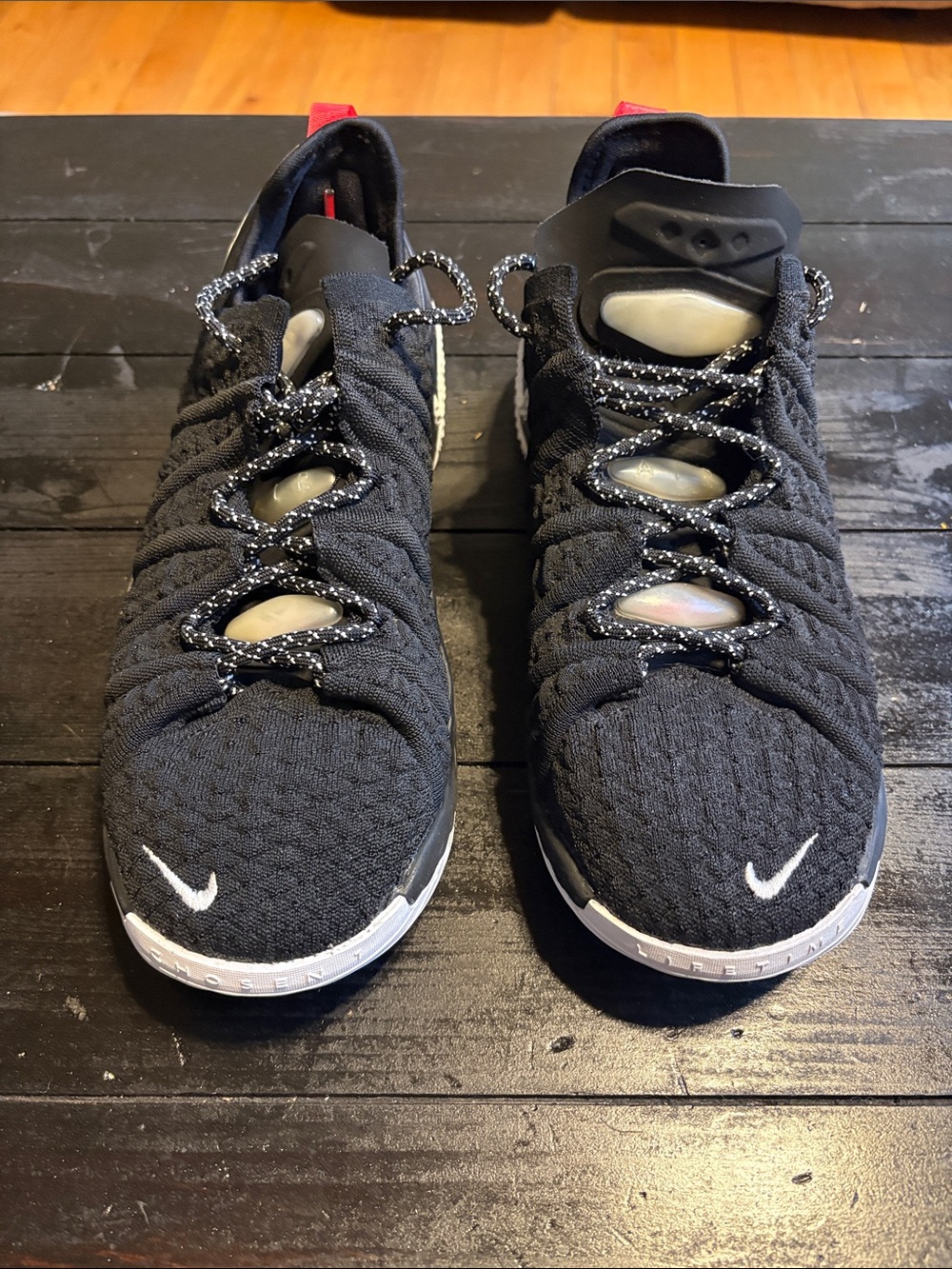 Nike Men’s Black Knit Sneakers with White Accents and Reflective Laces